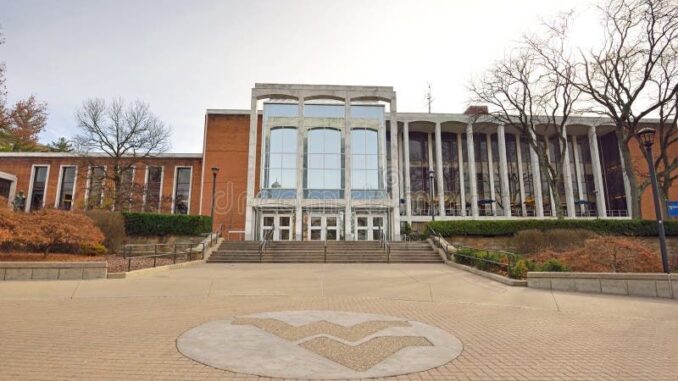 wvu-campus-morgantown-west-virginia-november-flying-wv-logo-sits-sidewalk-front-mountainlair-student-center-54488874